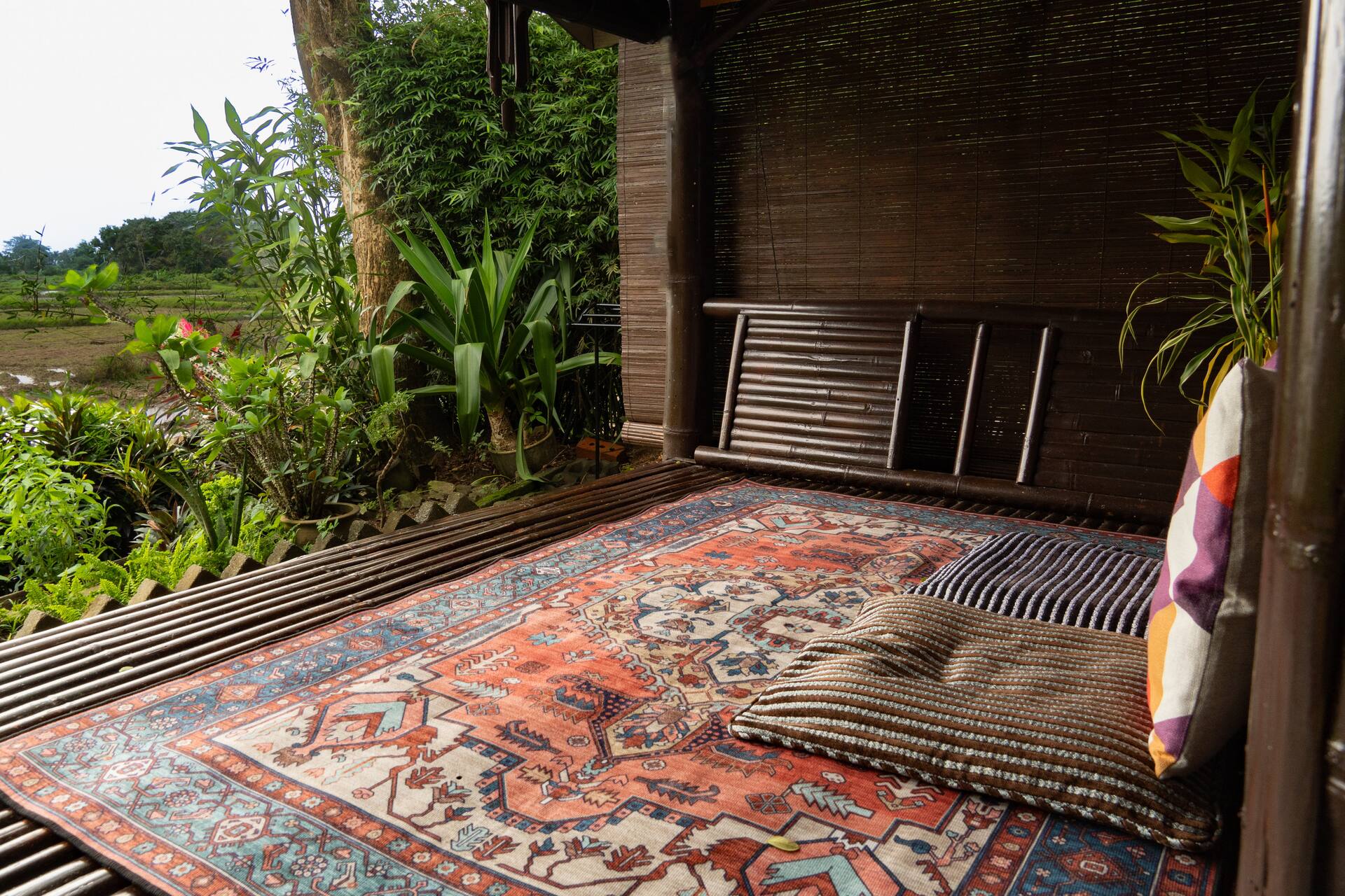Sunset Bambu Villa outdoor seating with paddy field panorama