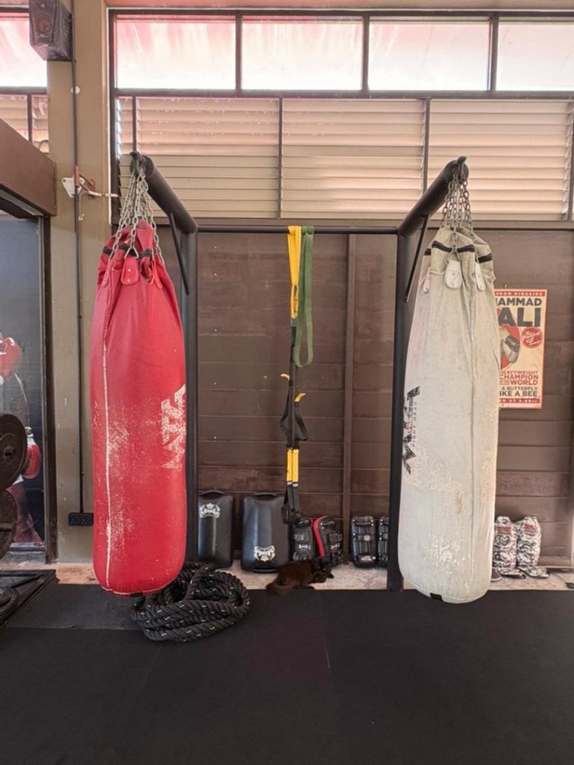 Muay Thai heavy bags, battle ropes and wall pads at Bambu Getaway gym, Langkawi