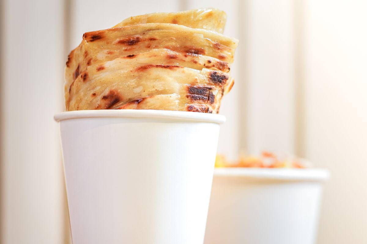 Freshly made roti canai flatbread stacked and ready to serve, Malaysia